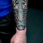 Tiger tattoo design wrap around the arm